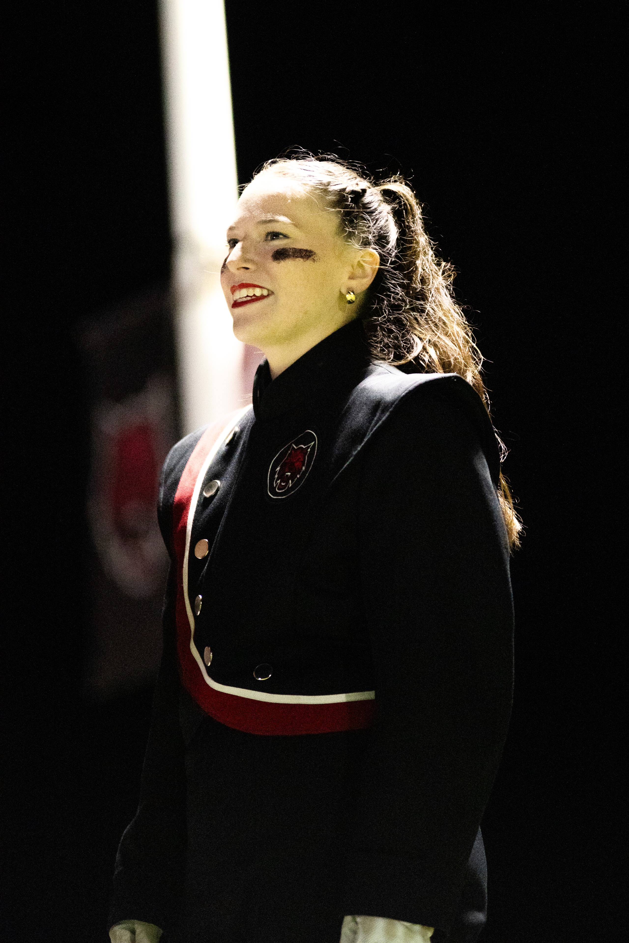 Mrs. Liv performing with the marching band